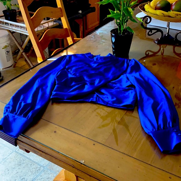 Might night Blue Bebe blouse size 8. New